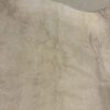 Close-up of beige suede texture.