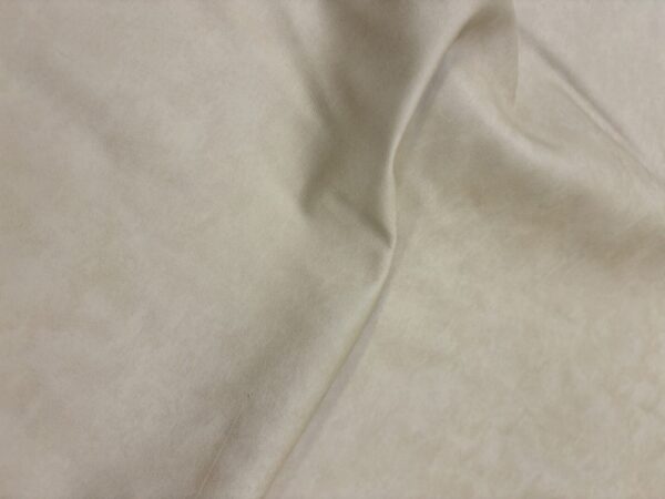 Cream-colored fabric with subtle texture.
