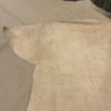 Light beige leather hide sheets.