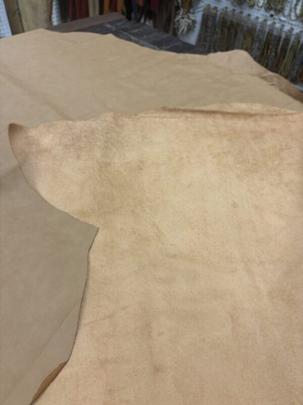 Light beige leather hide sheets.