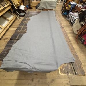 IMG_3067 Gray leather hide on wooden floor.