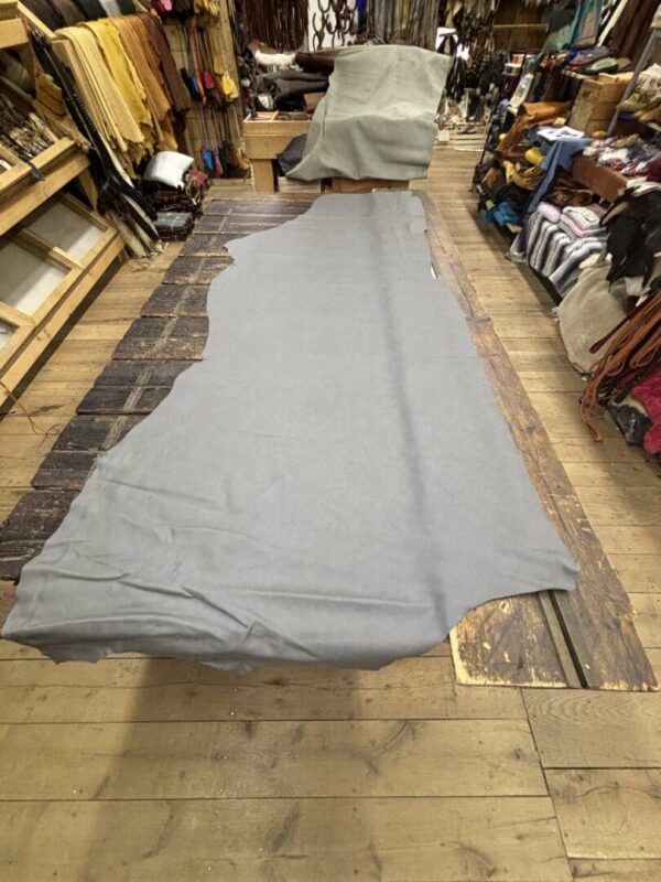 IMG_3067 Gray leather hide on wooden floor.