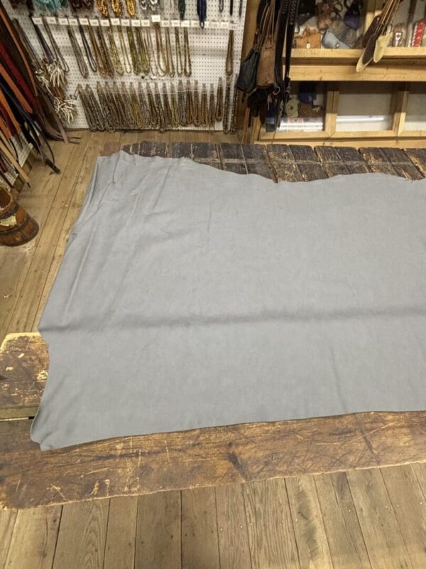 IMG_3068 Gray leather on a wooden surface.