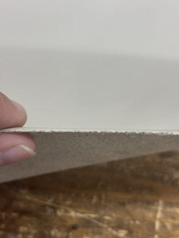 Close up of white cardboard texture.