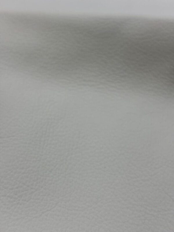 White textured leather surface.