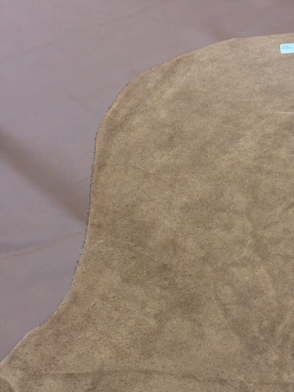 Brown suede leather fabric sample.