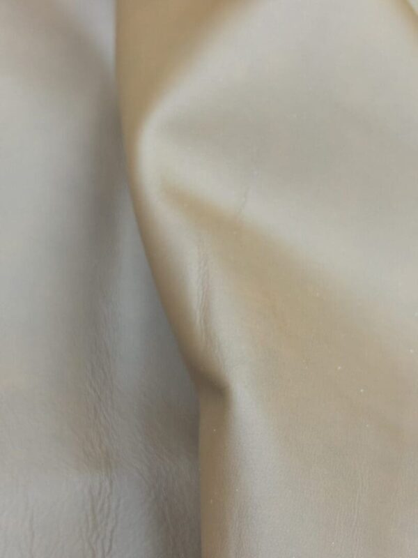Close up of beige leather texture.