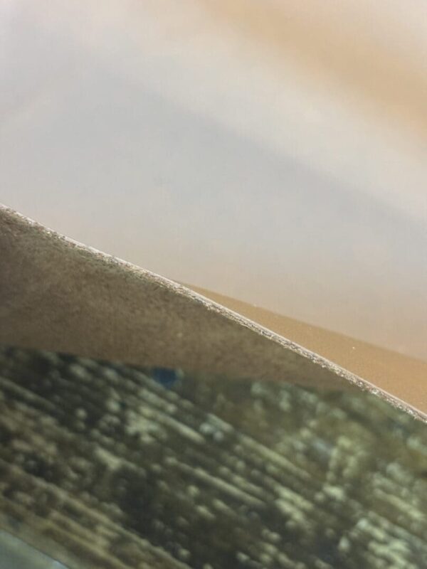 Close-up of a folded piece of leather.