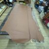 Brown leather hide on wooden table.