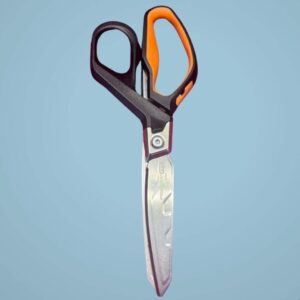 OAYU5313 Black and orange scissors on blue background.
