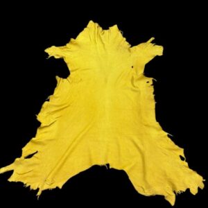 TRXE1320 Yellow fabric laid out on a black background.