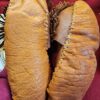 Traditional leather moccasins on display.