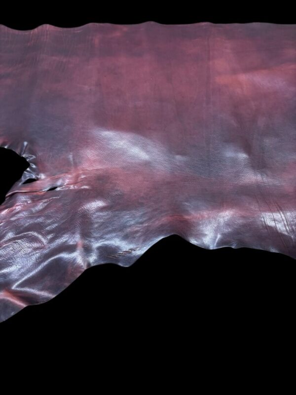 Dark, smooth leather hide with textured surface.