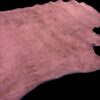JIMN6021 Pink leather hide on a dark background.