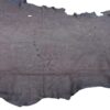 Leather hide laying flat on surface.