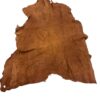 QJJP1636 Brown suede leather hide on white background.