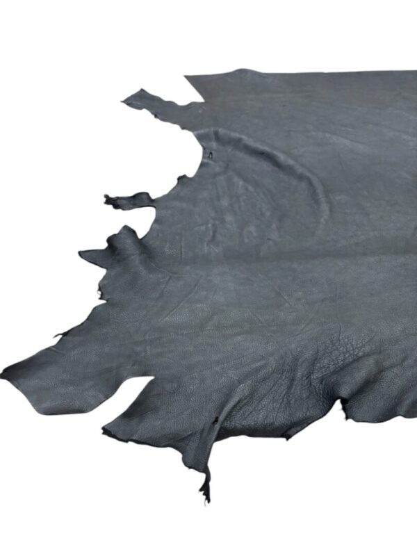 Dark leather hide with frayed edges.