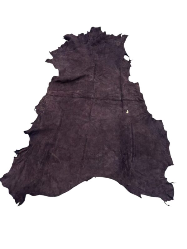 Black animal hide laid flat on surface.