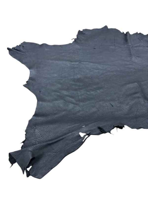 YKFK3162 Black leather hide on a white background.