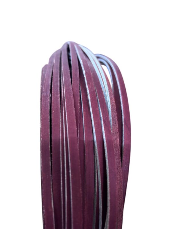 Maroon sanding belts stacked vertically.