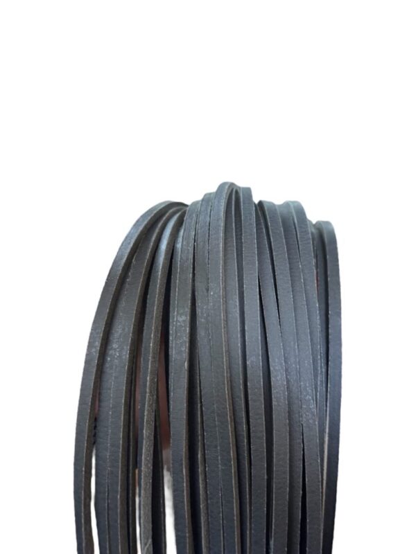 Roll of dark leather strips.