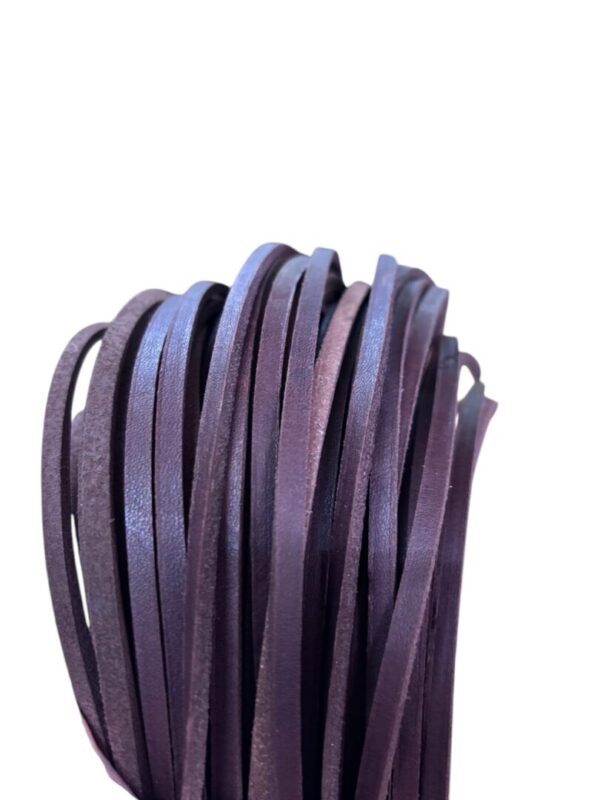 Purple leather strips on white background.
