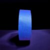 Glowing blue tape against dark background.